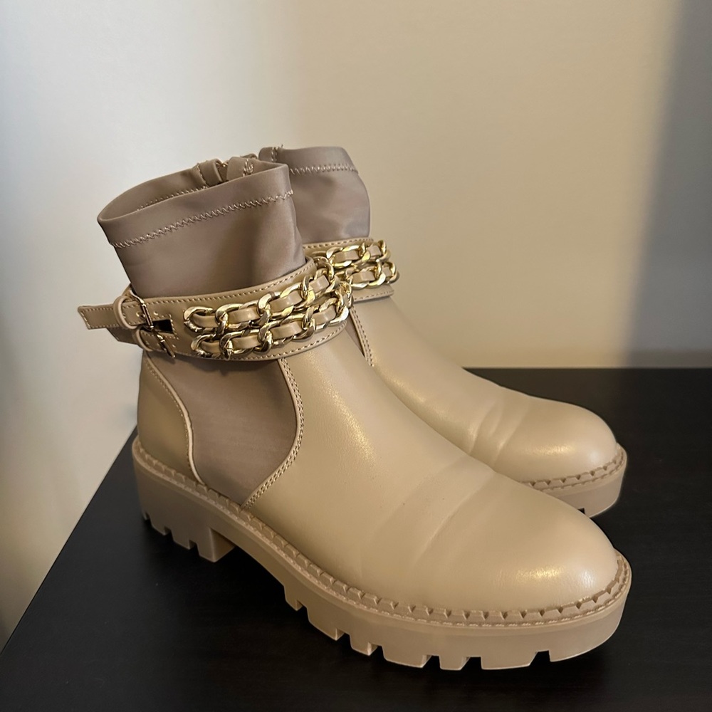 Jones New York ankle boots with gold chain accents.